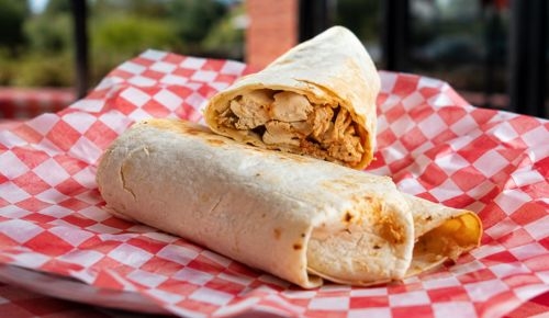 Chicken wrap on a red checkered table
