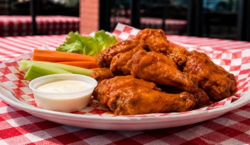 Chicken wings with celery and blue cheese